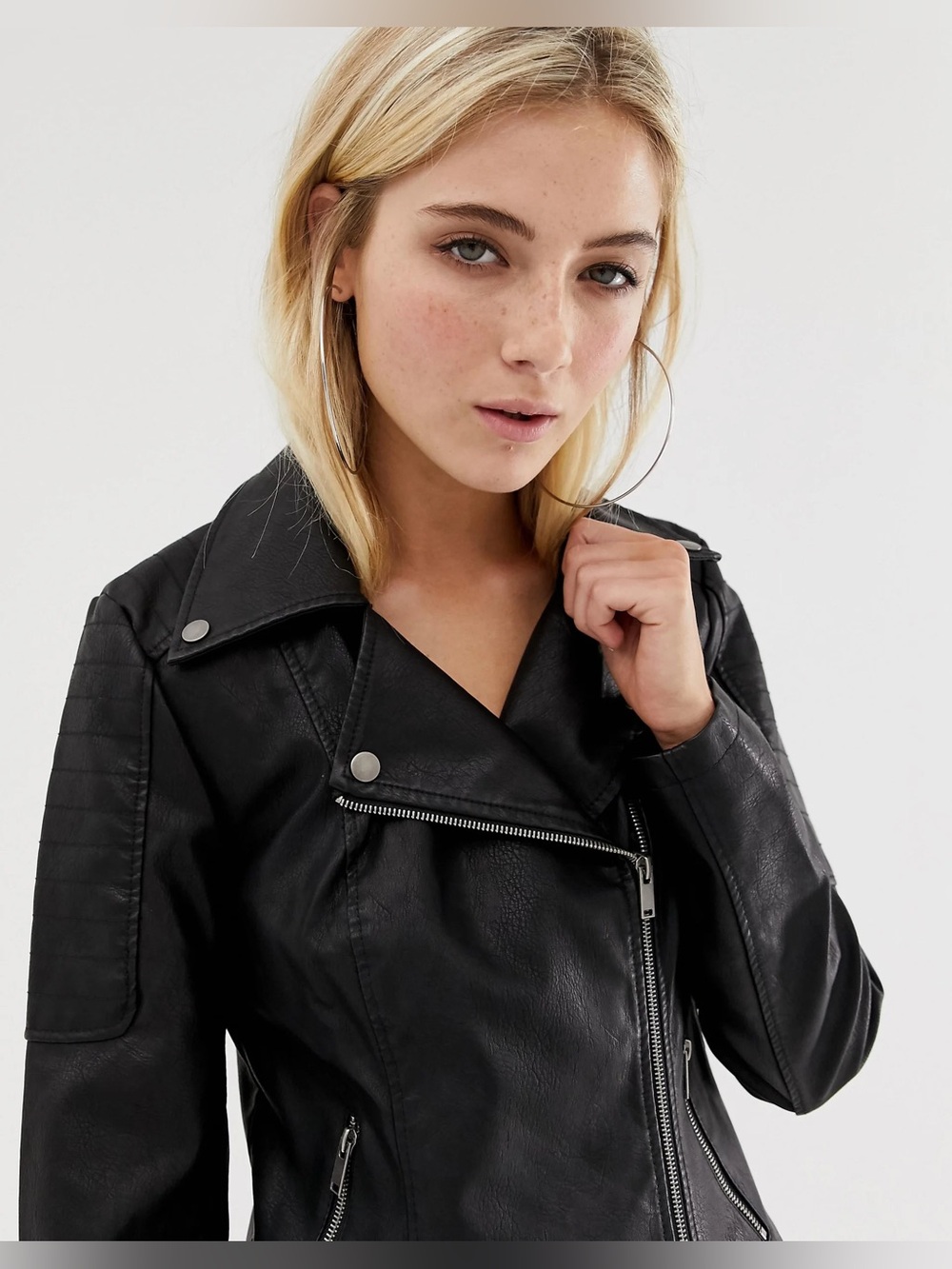 Faux leather biker jacket in black. Size Small.